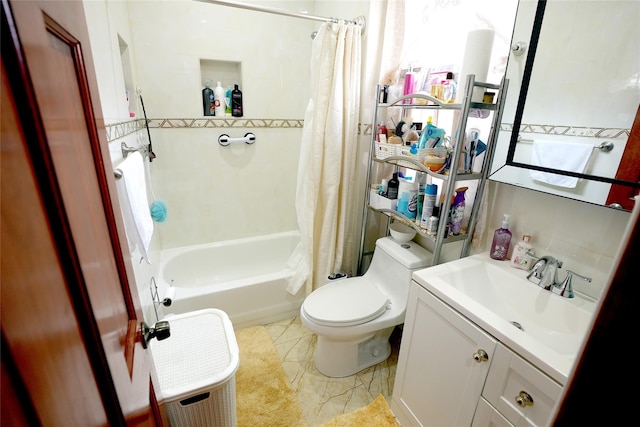 full bathroom featuring vanity, shower / bath combination with curtain, and toilet