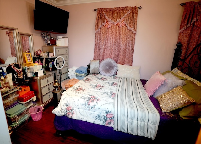 bedroom with ornamental molding