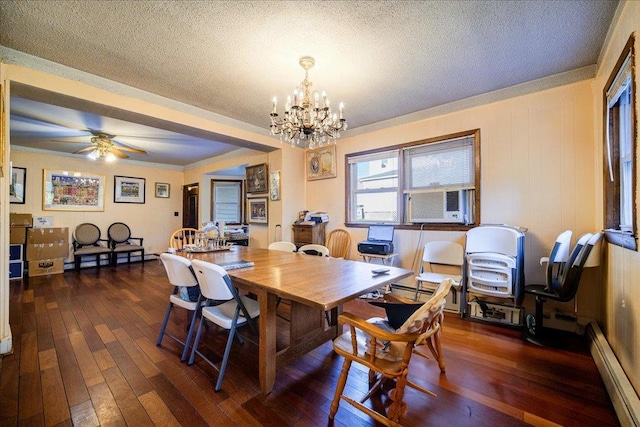 dining room featuring baseboard heating, dark hardwood / wood-style floors, ceiling fan with notable chandelier, and a textured ceiling