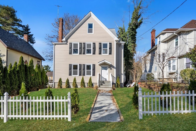 front of property with a front lawn