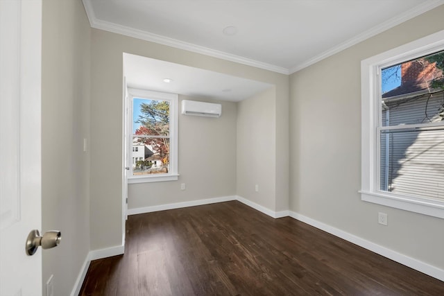 empty room featuring dark hardwood / wood-style flooring, a wall mounted air conditioner, and ornamental molding