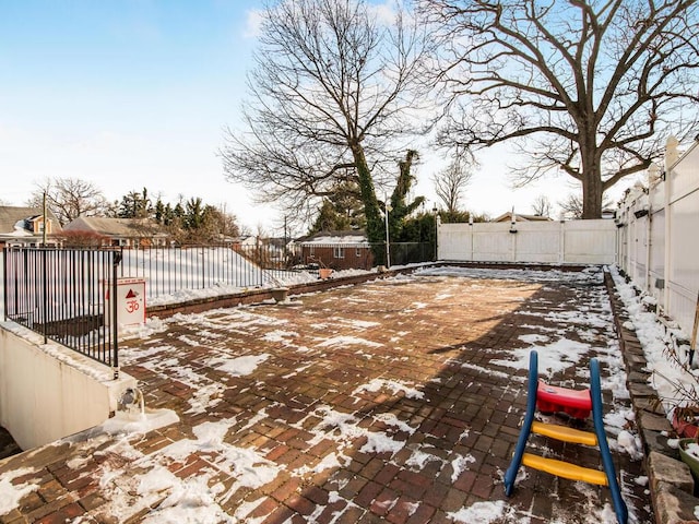 view of yard covered in snow