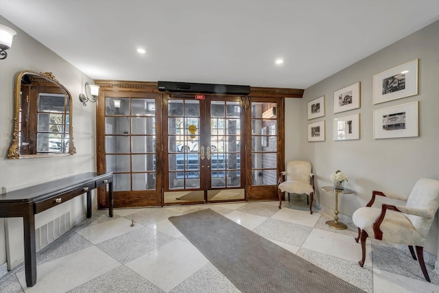 living area featuring french doors