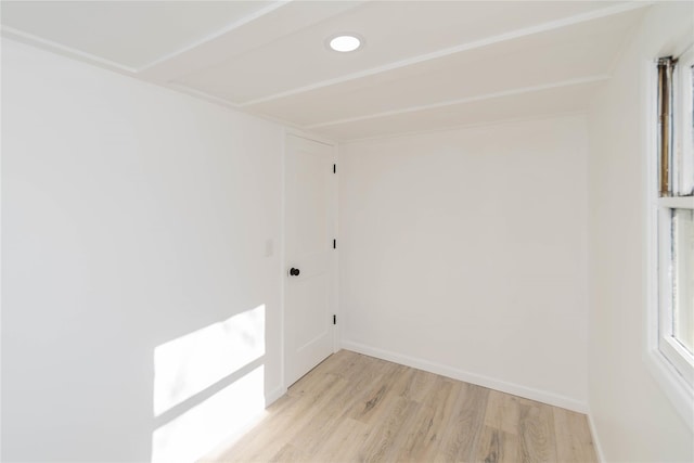 unfurnished room with light hardwood / wood-style flooring