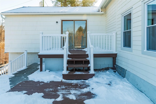 view of snow covered deck