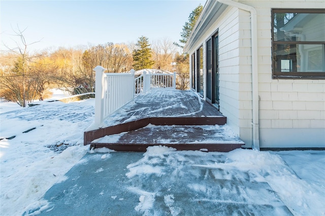 view of snow covered deck