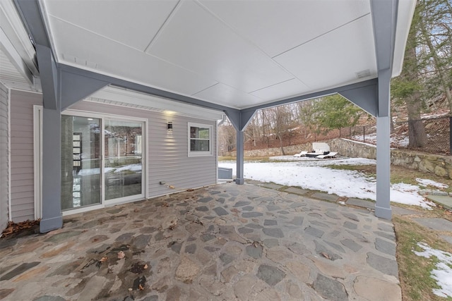 view of snow covered patio