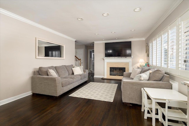 living room featuring ornamental molding and dark hardwood / wood-style flooring