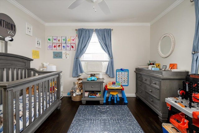 bedroom featuring ornamental molding, dark hardwood / wood-style floors, and a nursery area