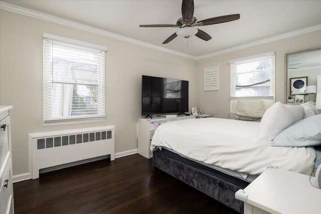 bedroom featuring dark wood-type flooring, ceiling fan, ornamental molding, and radiator