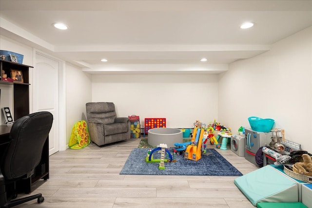 game room featuring light hardwood / wood-style floors