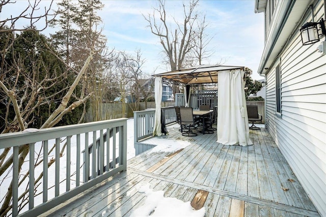 wooden deck featuring a gazebo