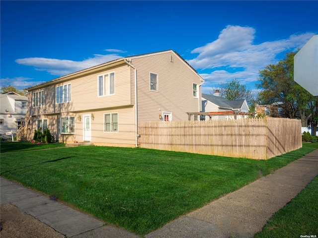 exterior space featuring a lawn