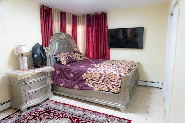 tiled bedroom featuring a baseboard radiator