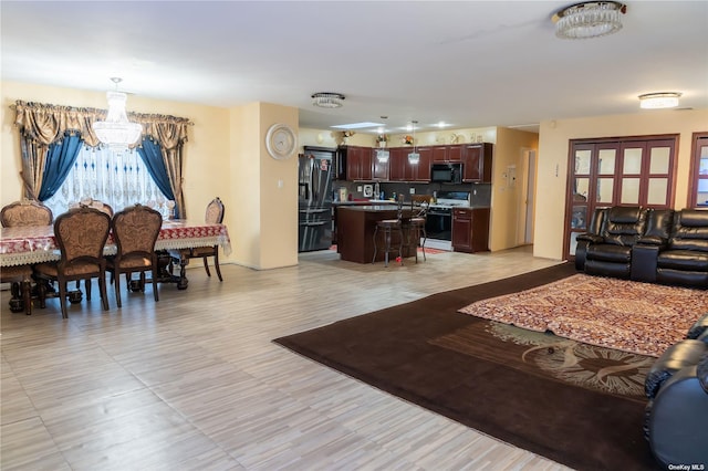 living room featuring an inviting chandelier