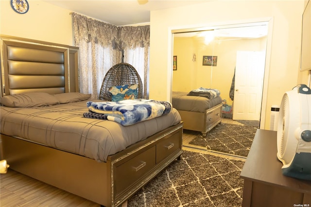 bedroom featuring dark wood-type flooring