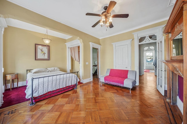 bedroom with ceiling fan, crown molding, and light parquet flooring