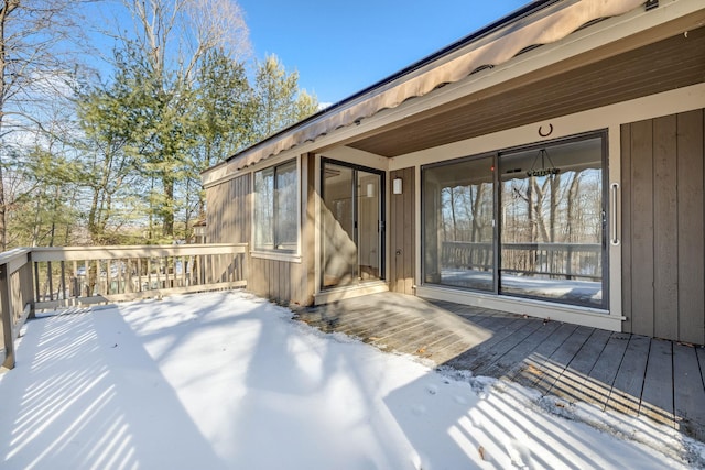 view of snow covered deck