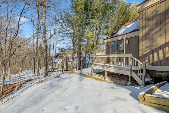 view of snow covered deck