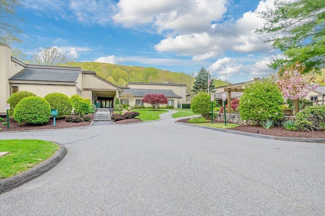 view of front of home with a mountain view