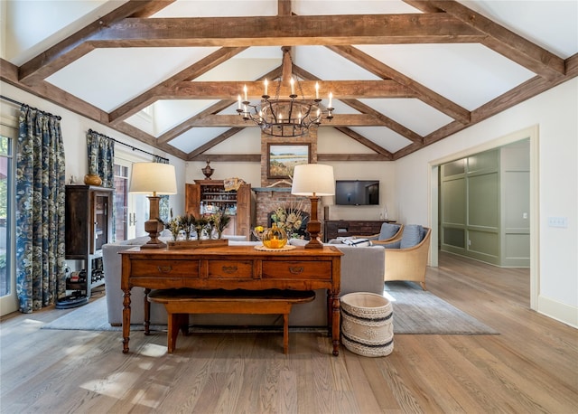 living room featuring high vaulted ceiling, beam ceiling, light hardwood / wood-style floors, and a notable chandelier