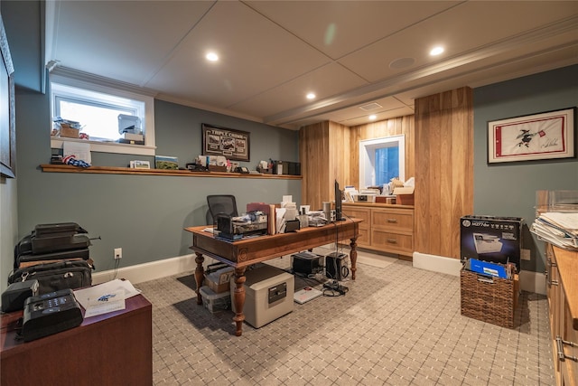 office with ornamental molding and wood walls