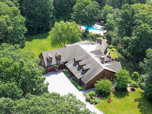 1750 Laurel Lake Dr, Mattituck, NY 11952 - aerial view of property and surrounding area featuring a pool and a heavily wooded area