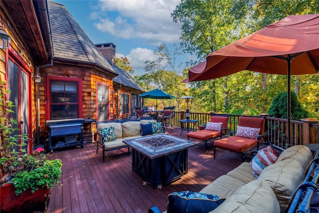 1750 Laurel Lake Dr, Mattituck, NY 11952 - wooden deck featuring an outdoor living space with a fire pit