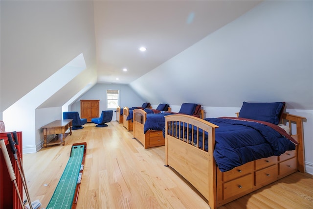 1750 Laurel Lake Dr, Mattituck, NY 11952 - bedroom featuring light wood-style flooring and lofted ceiling