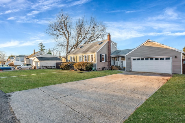 view of front of home with a garage and a front yard