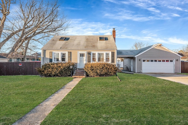 new england style home with a garage and a front yard