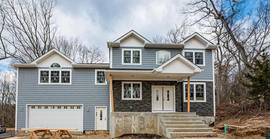 view of front of home with a garage