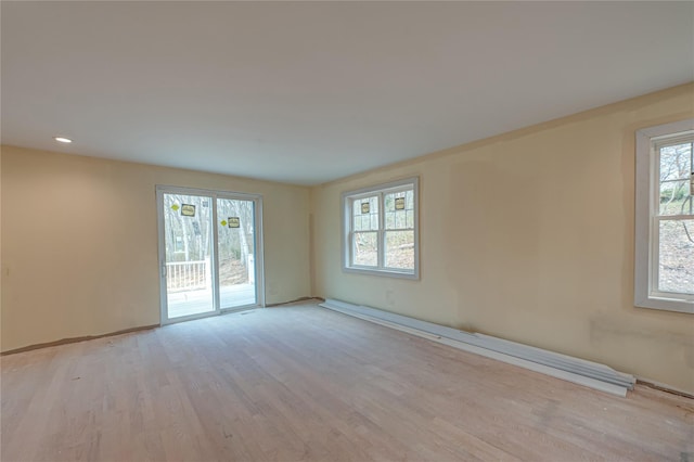 597 Pulaski, Kings Park, NY 11754 - spare room with light wood finished floors and recessed lighting