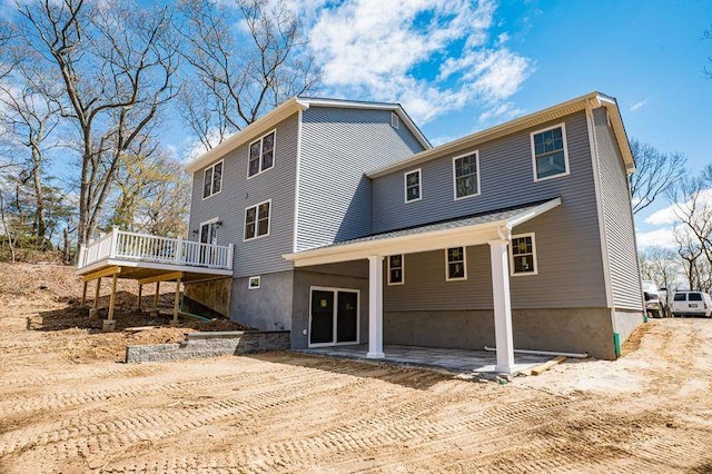 597 Pulaski, Kings Park, NY 11754 - back of house featuring a patio area and a deck