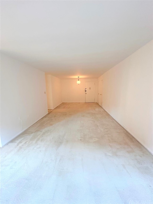 empty room featuring carpet floors