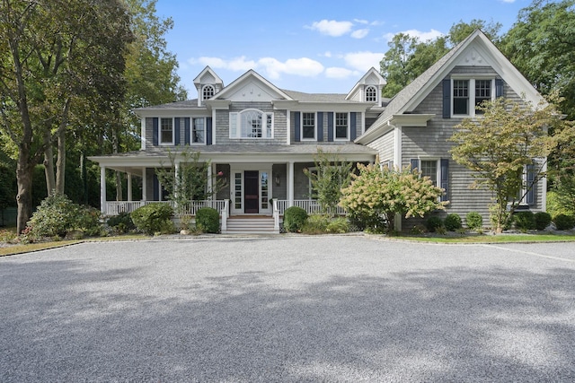 view of front of property featuring covered porch