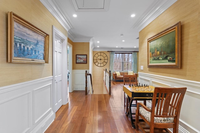 hallway featuring crown molding and hardwood / wood-style flooring