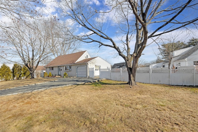 view of yard featuring a garage