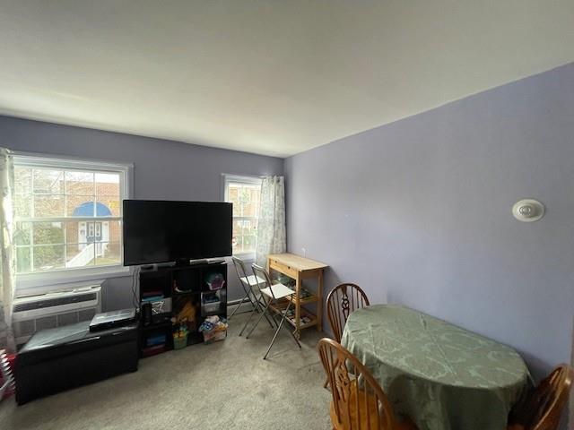 view of carpeted dining space