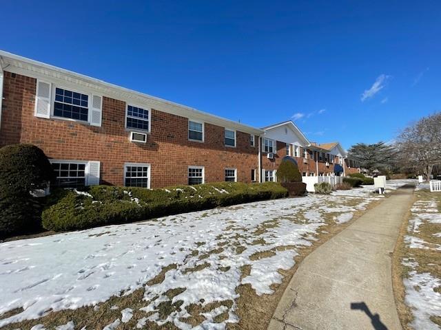 view of snow covered property