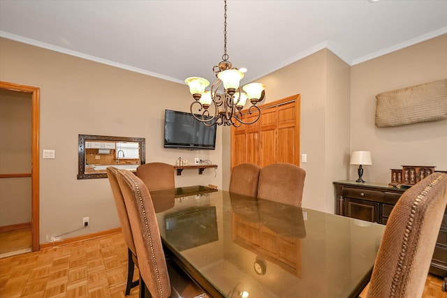 dining area with ornamental molding, a chandelier, and light parquet floors