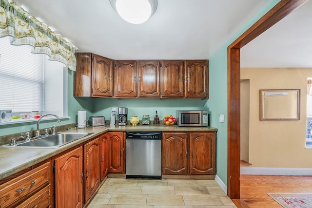 kitchen with stainless steel appliances and sink