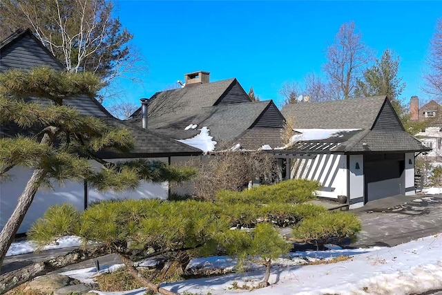 view of home's community with a garage