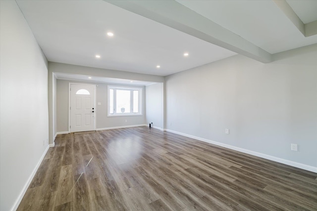 foyer entrance featuring dark hardwood / wood-style floors