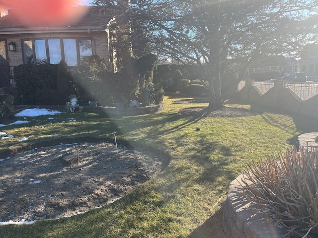 view of yard with fence