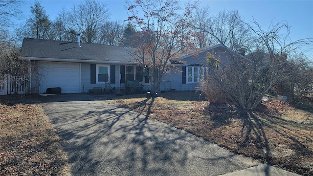 single story home featuring a garage