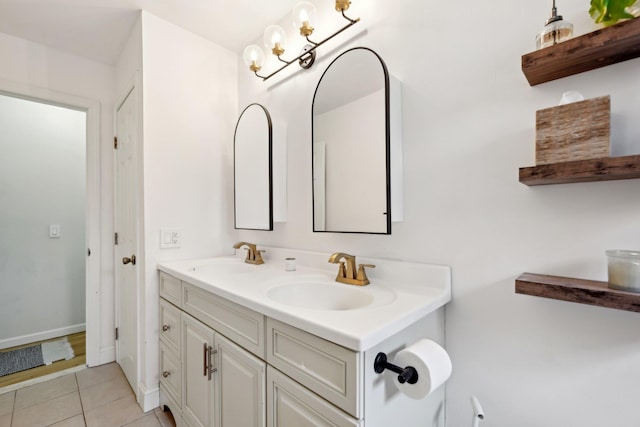 bathroom with tile patterned flooring and vanity