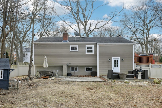 rear view of house featuring a patio area