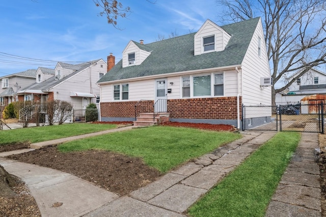 new england style home with a front yard