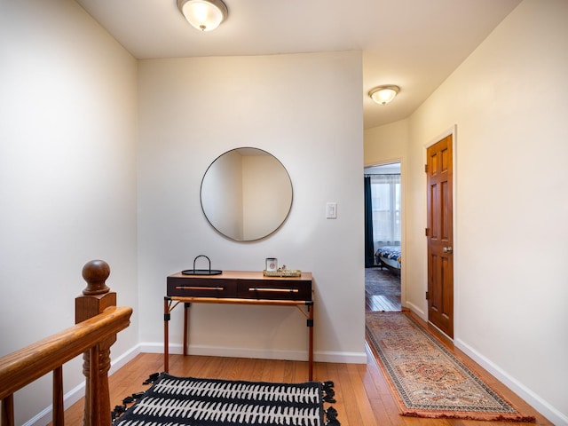 corridor featuring hardwood / wood-style floors